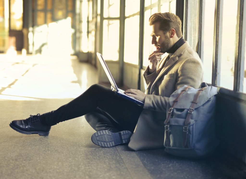 man looking for the LinkedIn Saved Jobs menu